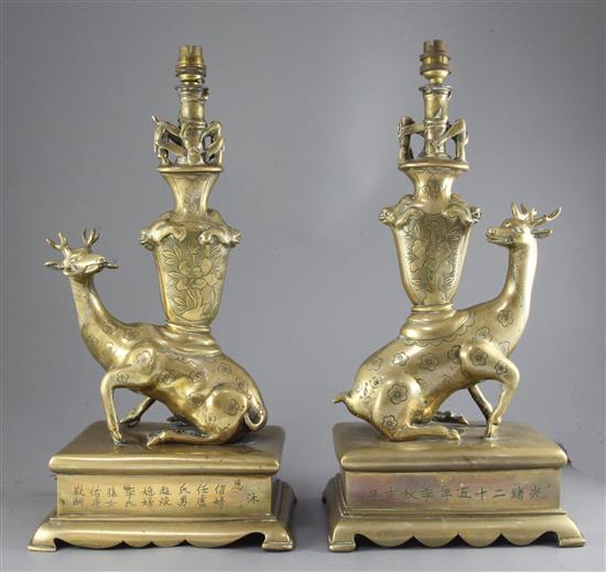 A pair of Chinese bronze altar jos-stick holders, Guangxu mark and of the period (1875-1908), total height 49.5cm